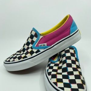 Slip-on Vans with pink, blue, and yellow accents